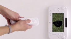 Review Wii Sports Club: Ook bij Golf biedt de GamePad een nieuwe spelervaring: leg hem op de grond, kijk naar je bal en sla hem weg met je Wii Remote!